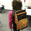 Streetwise EMOJI Bulletproof Backpack Orange on girl