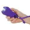 Safety Technology 80M Runt Stun Gun Purple in hand