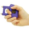 Spike Stun Gun Purple in hand